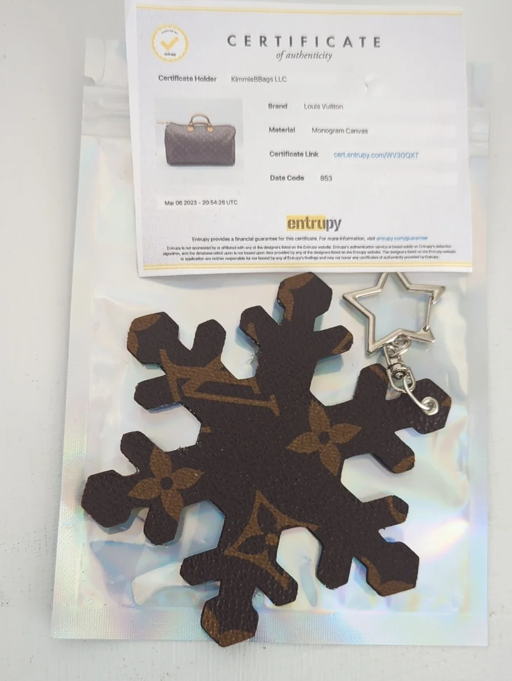 Louis Vuitton Brown Monogram Snowflake Key Charm with Silver Star Clasp COA Incl